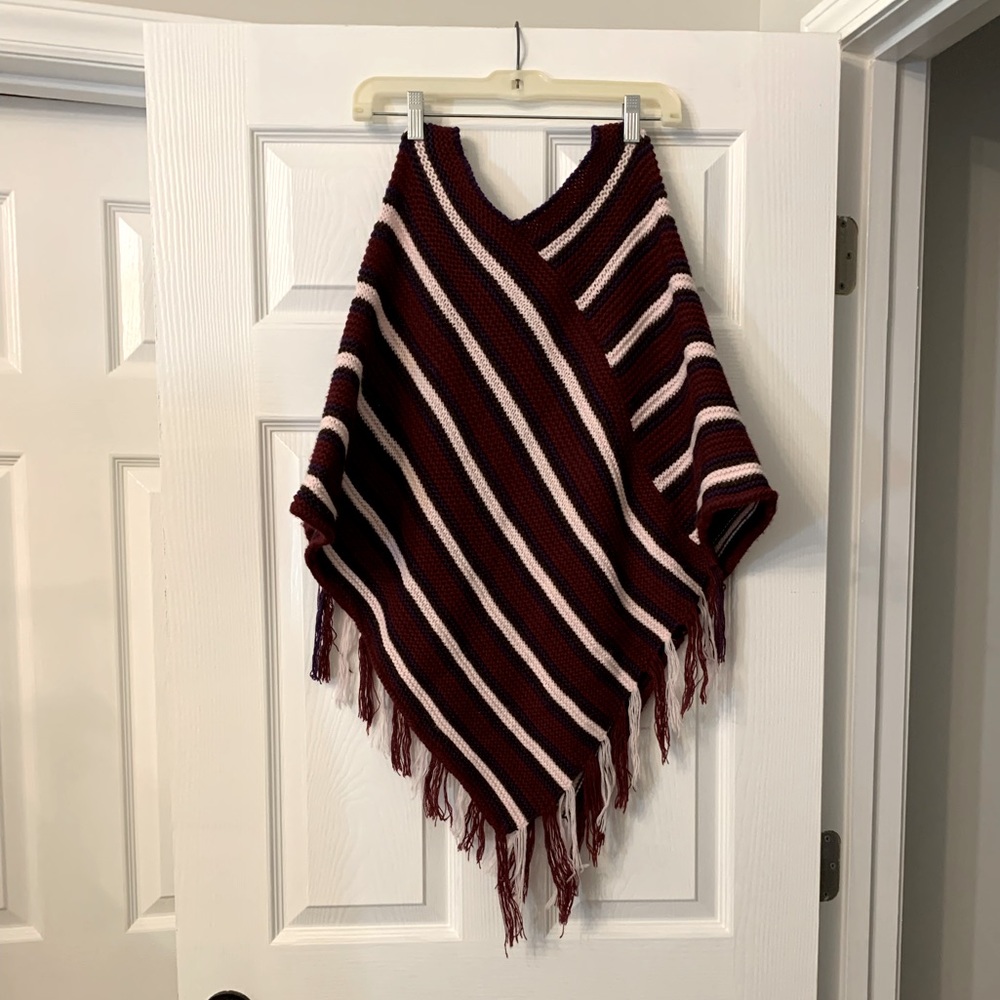 Knit striped poncho. One size.